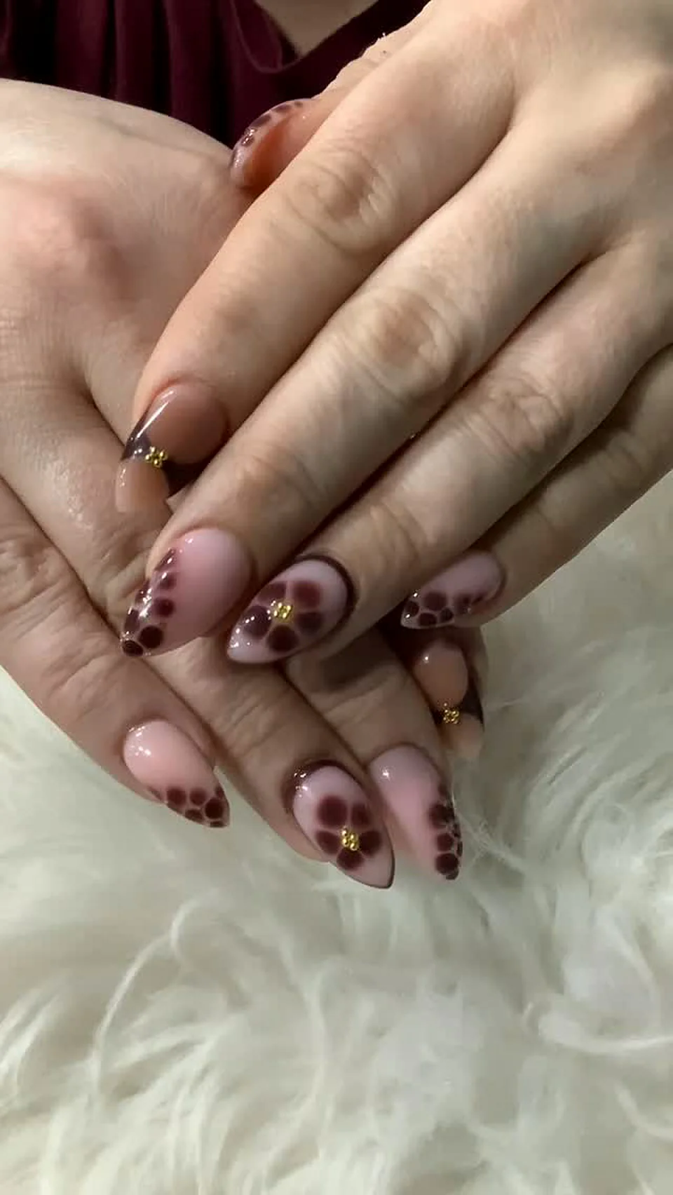 Nude nails with leopard print and hand-sculpted 3D flowers, Attraction Nails Salon