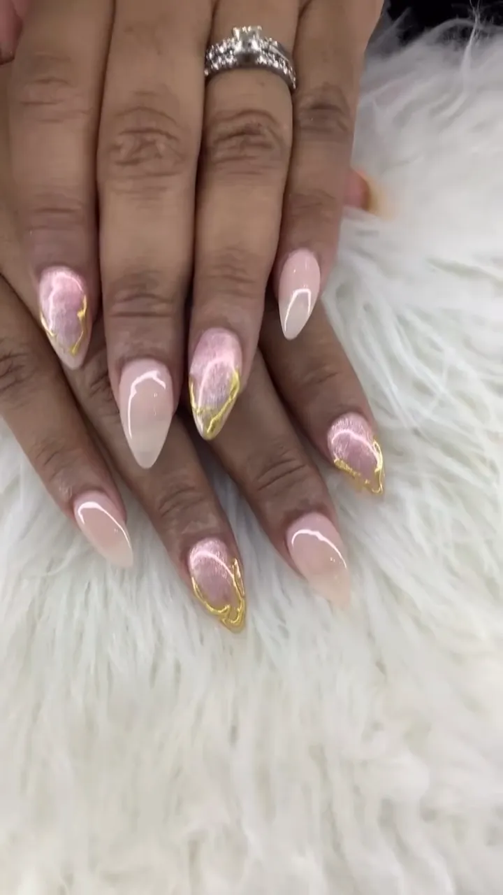 Video of soft pink nails with gold foil French tips